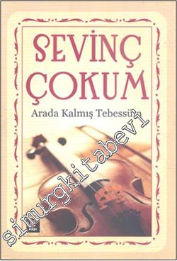 Arada Kalmış Tebessüm -