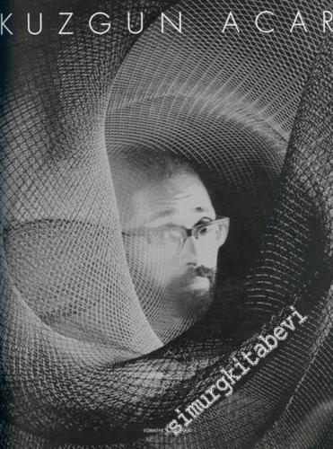 Kuzgun Acar -        2004